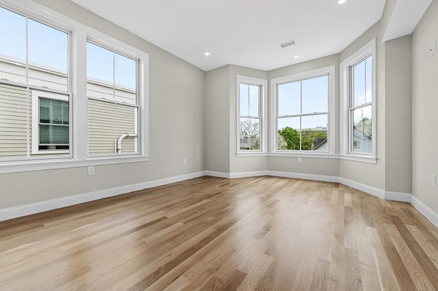 42 Waverly Unit 1, Boston, MA 02135 - empty room with light wood-style floors, baseboards, and recessed lighting