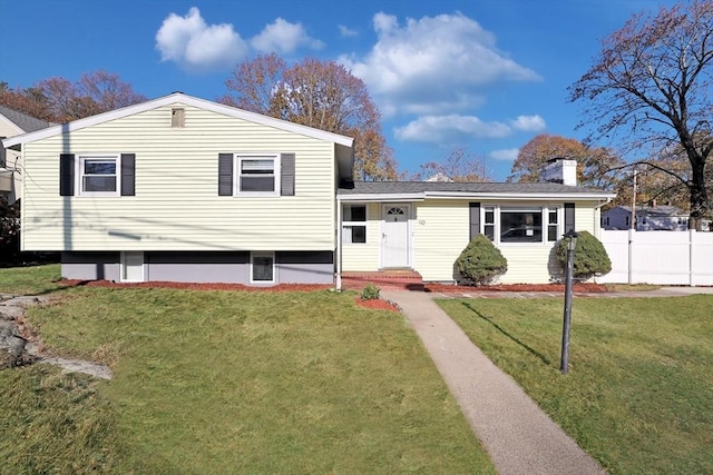 110 Walnut St, Canton, MA 02021 - split level home with a chimney