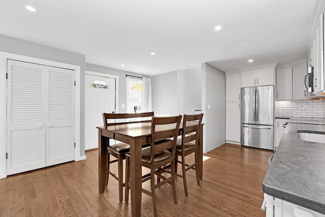 110 Walnut St, Canton, MA 02021 - dining area with dark wood-style floors and recessed lighting