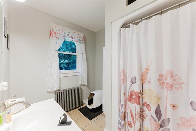 25 Garrison St, Fairhaven, MA 02719 - bathroom featuring radiator, tile patterned floors, and a shower with curtain