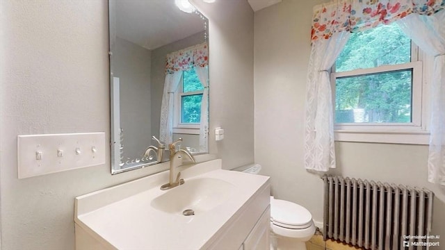 25 Garrison St, Fairhaven, MA 02719 - bathroom with radiator heating unit and vanity