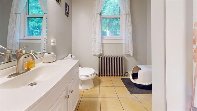 25 Garrison St, Fairhaven, MA 02719 - bathroom featuring radiator heating unit, vanity, and tile patterned flooring