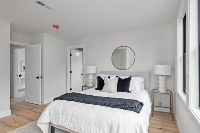 bedroom featuring light hardwood / wood-style floors