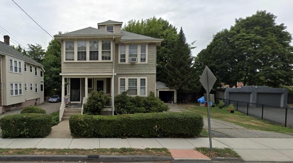 view of front of property with fence