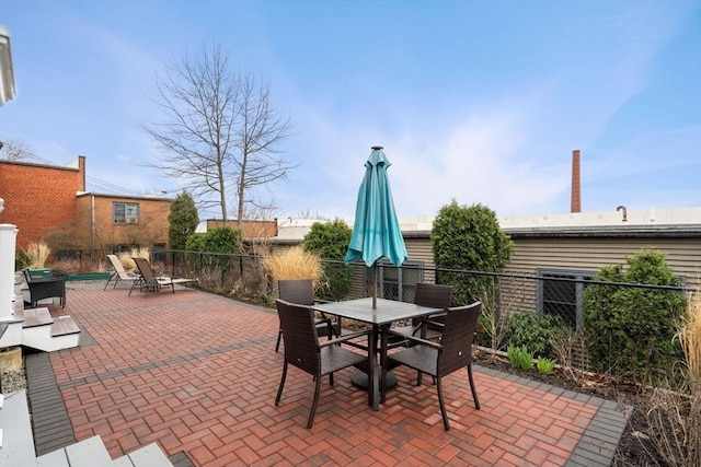 view of patio / terrace with a fenced backyard and outdoor dining space