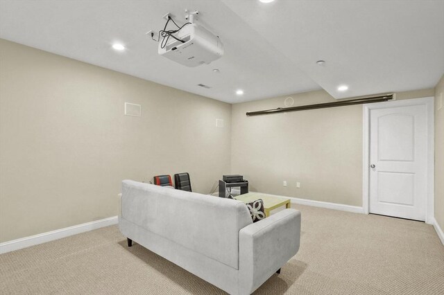 living area with baseboards, carpet, and recessed lighting