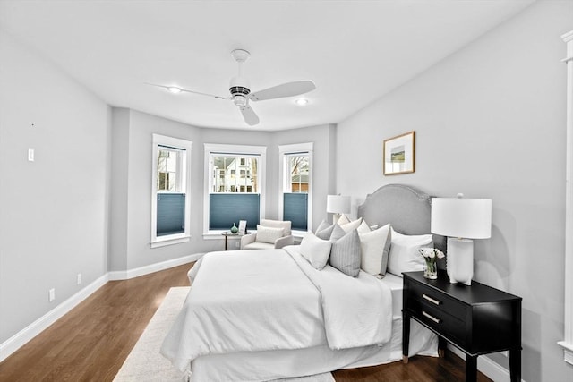 bedroom with hardwood / wood-style flooring and ceiling fan