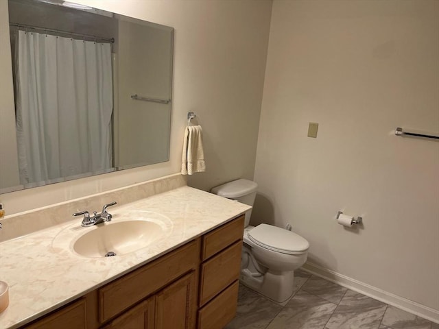 bathroom featuring curtained shower, toilet, vanity, baseboards, and marble finish floor