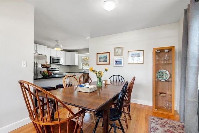 326 Austin St Unit 0, Newton, MA 02465 - dining room with light wood finished floors