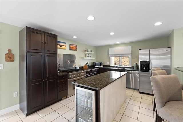 99 Ashburton Ave, Marshfield, MA 02050 - kitchen featuring stainless steel appliances, a sink, dark stone counters, wine cooler, and light tile patterned floors