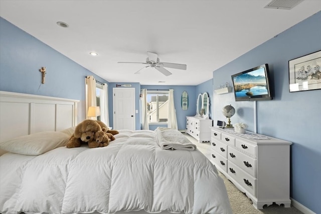 carpeted bedroom featuring ceiling fan