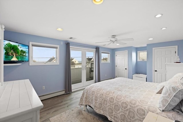99 Ashburton Ave, Marshfield, MA 02050 - bedroom with a baseboard heating unit, access to exterior, wood finished floors, multiple windows, and recessed lighting