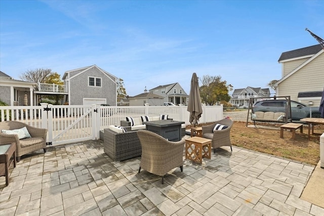 view of patio / terrace featuring a trampoline and an outdoor living space