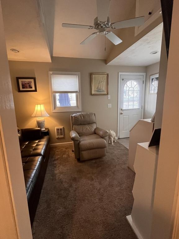 99 Ashburton Ave, Marshfield, MA 02050 - carpeted living room featuring ceiling fan and baseboards