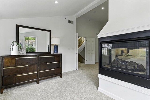 12 Paul Revere Path Unit 12, Hopkinton, MA 01748 - bedroom with lofted ceiling, carpet, and recessed lighting