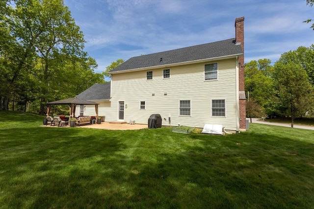 48 Logans Run, Attleboro, MA 02703 - back of house featuring a chimney, a yard, a patio area, outdoor lounge area, and a gazebo