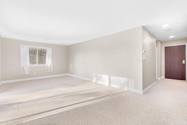 empty room with carpet flooring