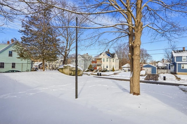 view of yard covered in snow