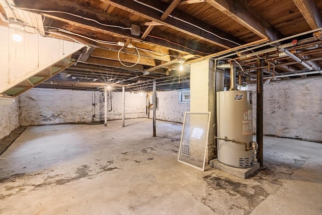 basement featuring gas water heater