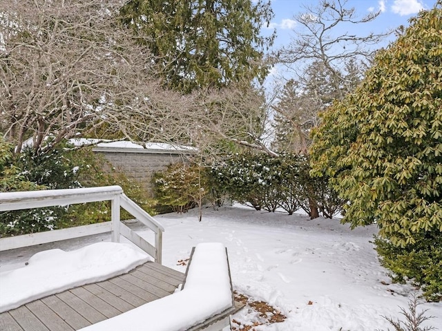 view of snow covered deck