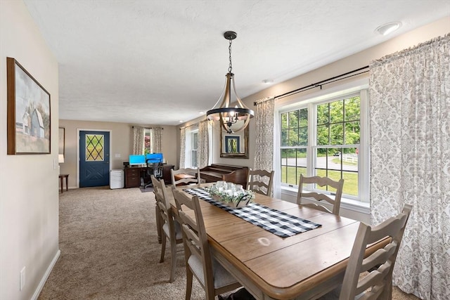 100 Elm St, Marshfield, MA 02050 - dining area featuring a chandelier and carpet floors
