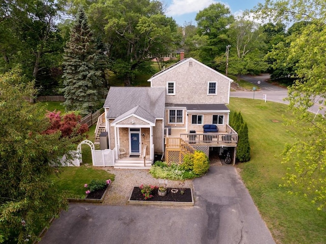 100 Elm St, Marshfield, MA 02050 - view of front of property with stairway, a deck, a front yard, asphalt driveway, and a chimney
