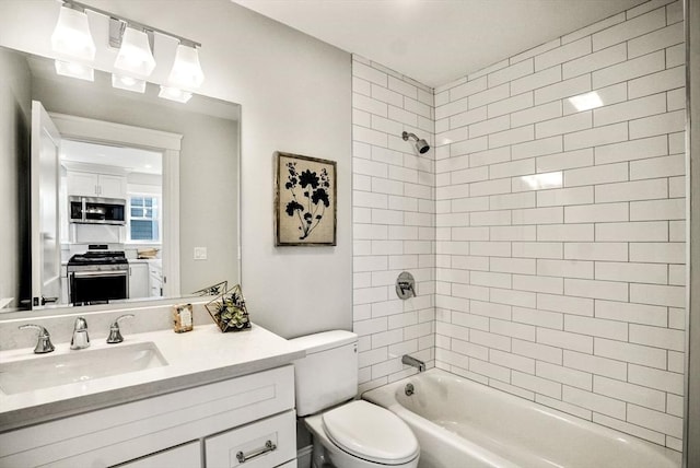 full bathroom with toilet, vanity, and shower / tub combination