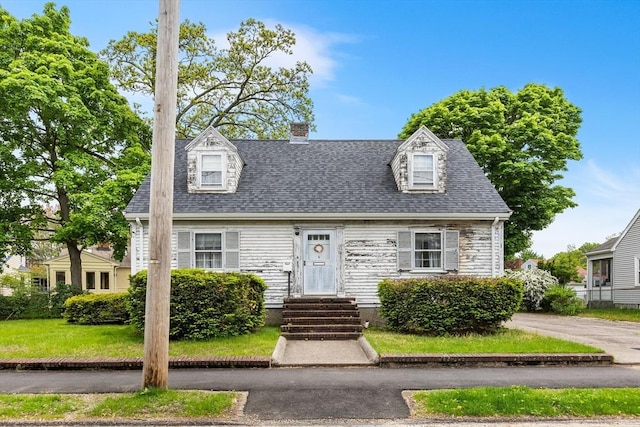 6 Audubon Rd, Milton, MA 02186 - cape cod house with a chimney and roof with shingles