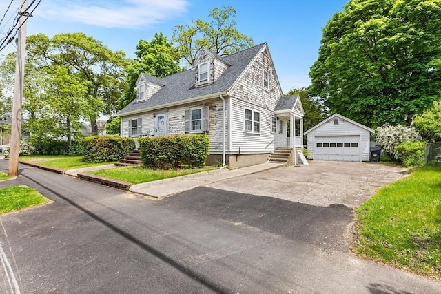 6 Audubon Rd, Milton, MA 02186 - new england style home featuring an outbuilding, a detached garage, and roof with shingles