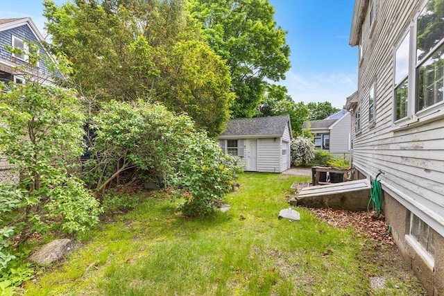 6 Audubon Rd, Milton, MA 02186 - view of green lawn with an outbuilding and a shed