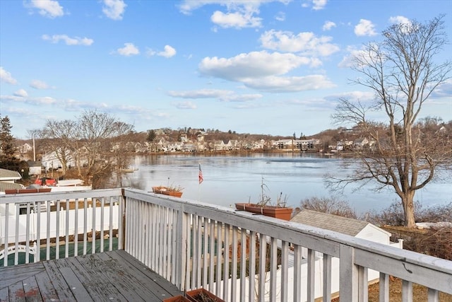 deck featuring a water view