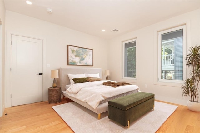 bedroom with light wood-type flooring