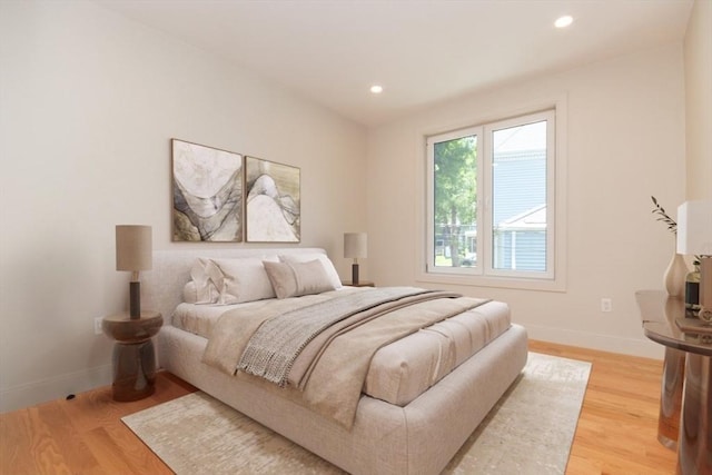 bedroom with light hardwood / wood-style flooring