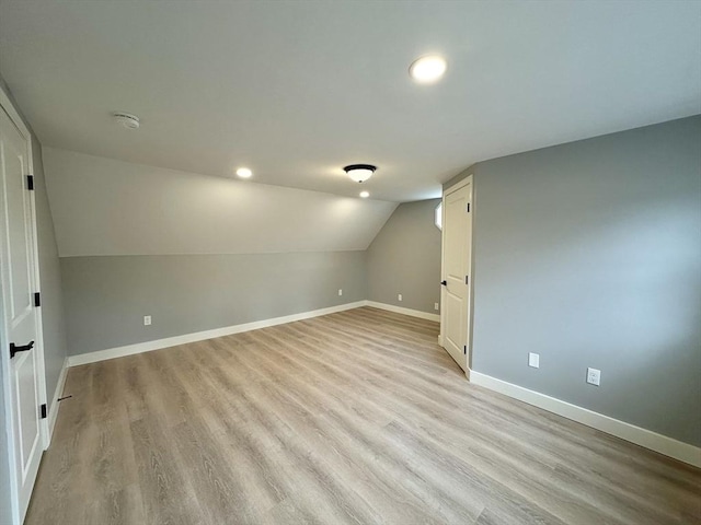 basement featuring light hardwood / wood-style floors