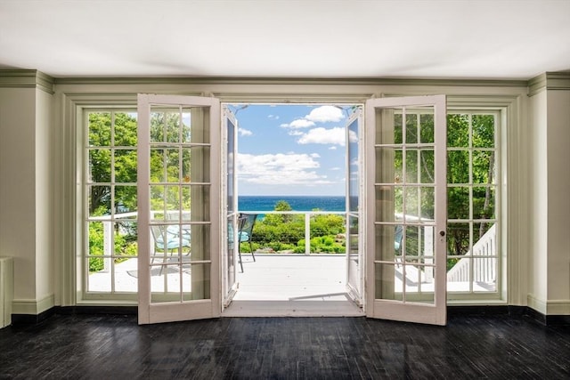 15 Brier Rd, Gloucester, MA 01930 - doorway to outside with a water view, french doors, hardwood / wood-style floors, and radiator heating unit