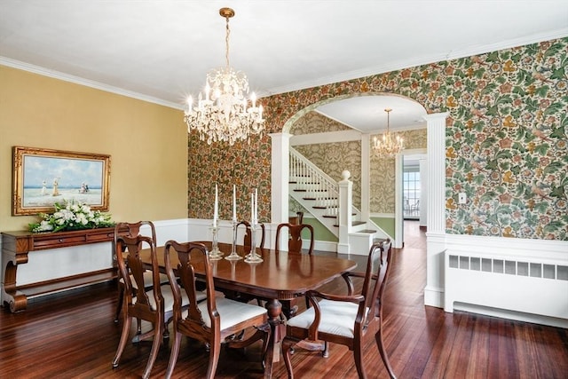 15 Brier Rd, Gloucester, MA 01930 - dining space featuring radiator heating unit, a chandelier, wallpapered walls, stairs, and wainscoting