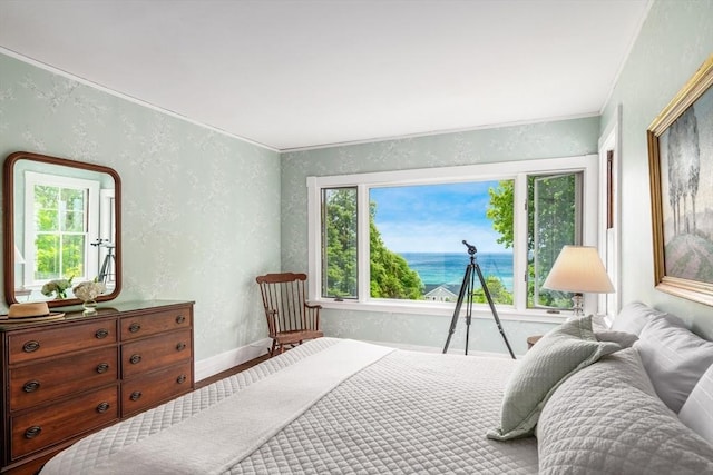 15 Brier Rd, Gloucester, MA 01930 - bedroom with a water view, multiple windows, a textured wall, ornamental molding, and wood finished floors