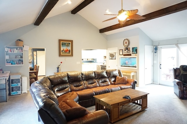 carpeted living room with lofted ceiling with beams and ceiling fan