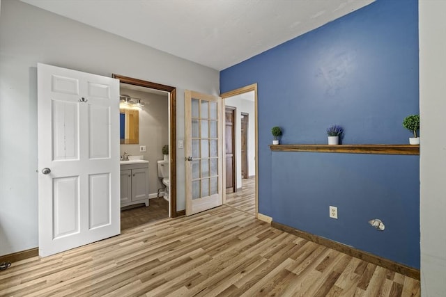 32 Dale St, Franklin, MA 02038 - unfurnished bedroom featuring light wood-style floors and ensuite bathroom