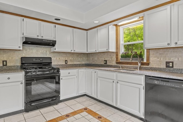 32 Dale St, Franklin, MA 02038 - kitchen with black appliances, under cabinet range hood, light tile patterned floors, white cabinetry, and recessed lighting
