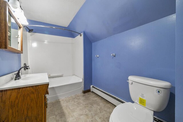 32 Dale St, Franklin, MA 02038 - full bath with a baseboard heating unit, vanity, shower / washtub combination, and tile patterned floors