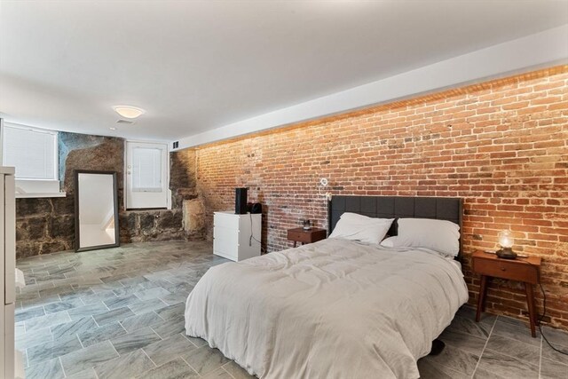 6 Brigham St Unit 1, Boston, MA 02128 - bedroom with brick wall