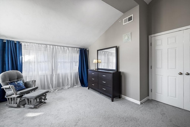 sitting room featuring visible vents, light carpet, high vaulted ceiling, and baseboards