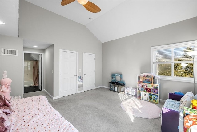 bedroom with visible vents, carpet flooring, connected bathroom, and baseboards