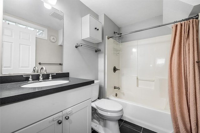 bathroom with tile patterned floors, visible vents, toilet, shower / bath combination with curtain, and vanity