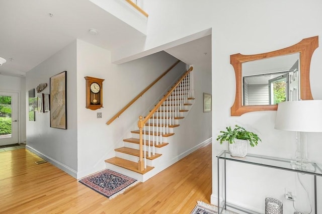 14 Parsons Hill Rd, Wenham, MA 01984 - stairway featuring wood finished floors, healthy amount of natural light, and baseboards