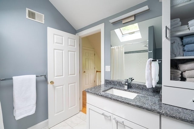 14 Parsons Hill Rd, Wenham, MA 01984 - full bath featuring a skylight, vanity, vaulted ceiling, and curtained shower