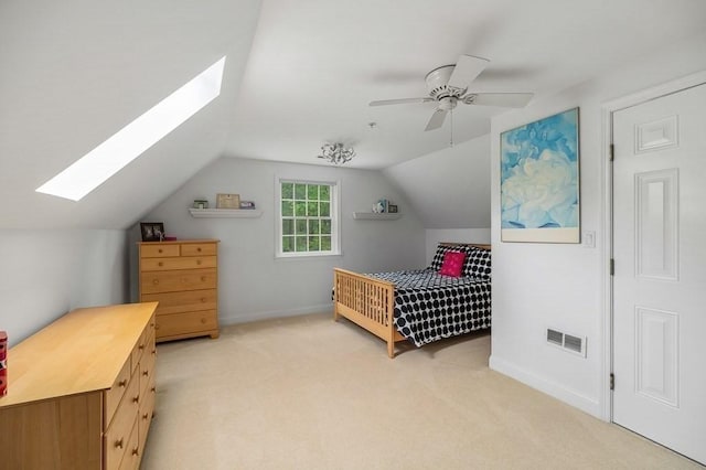 14 Parsons Hill Rd, Wenham, MA 01984 - bedroom featuring a skylight, light carpet, lofted ceiling, baseboards, and ceiling fan