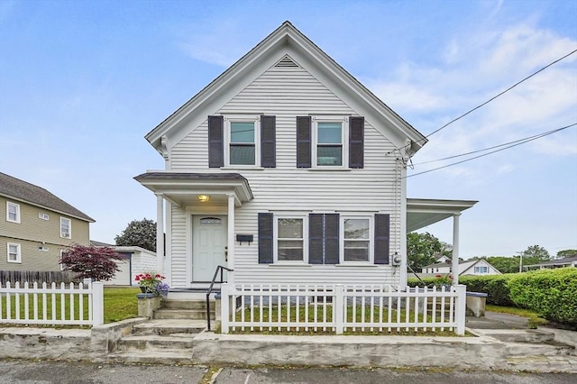 23 Starbird St, Lowell, MA 01854 - view of front of property with a fenced front yard