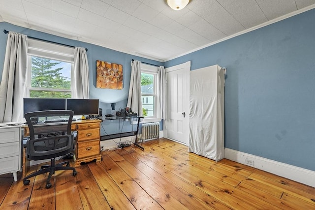 23 Starbird St, Lowell, MA 01854 - office area with radiator, hardwood / wood-style floors, and ornamental molding